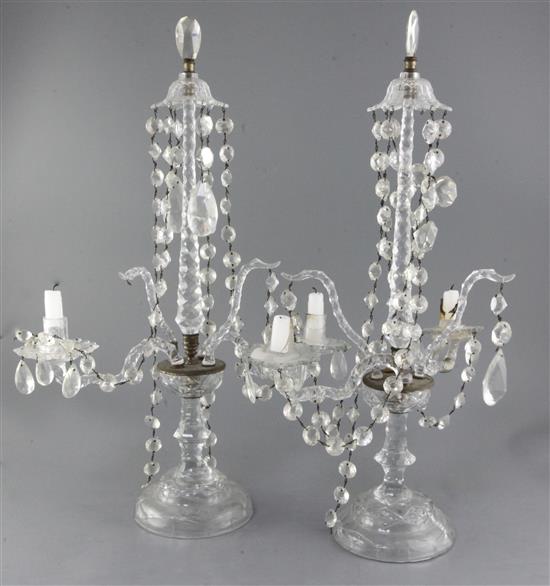 A pair of facet cut glass twin light and metal mounted lustre candelabra, 19th century, height 63.5cm